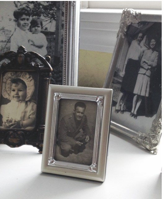 My father in uniform during the Second World War. The photo in the rear, to the left, shows him as a young boy holding his baby sister. 